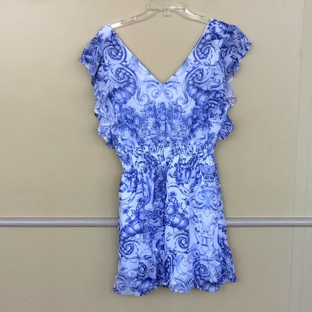 Express dress size medium. Brand new with retail tags and prices. Style 6800634